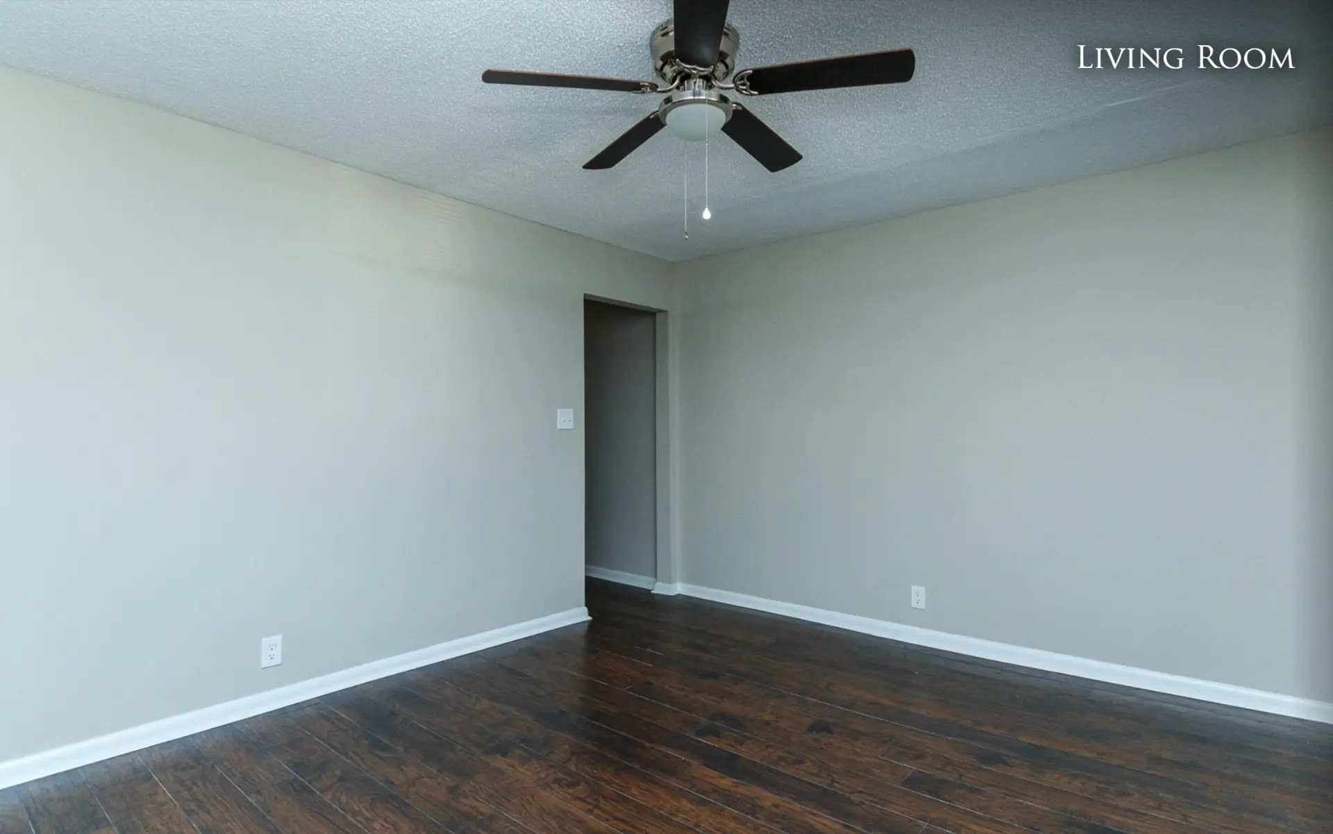 Unit A living room toward the hallway