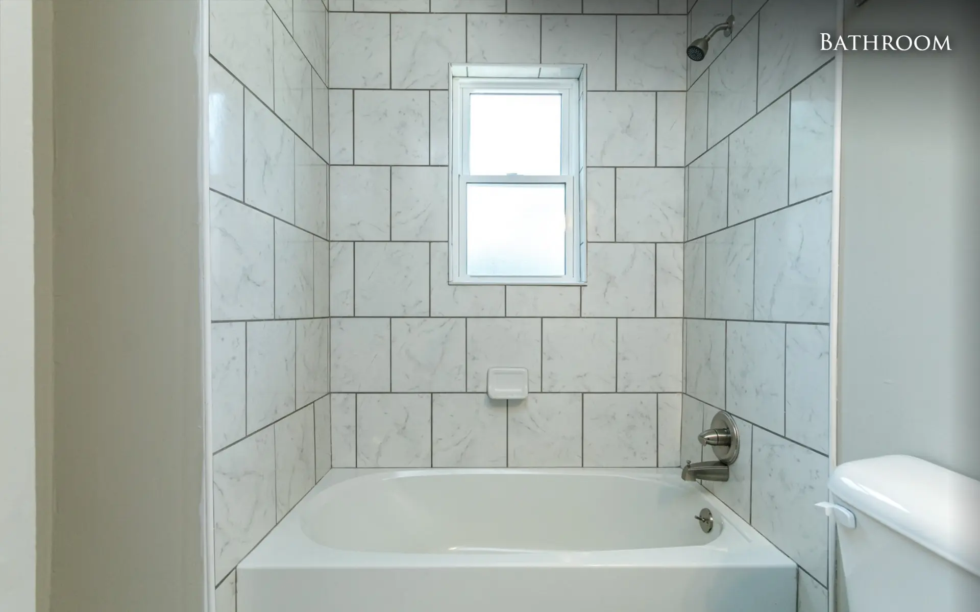 Unit B tiled tub and shower